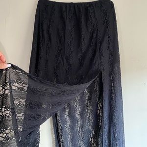 Super cute boho long skirt. Has a mini skirt underneath and a slit on the side.